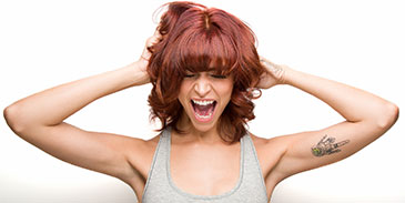 A joyful woman raises her arms in celebration, captioned 'What a Feeling!' for a joyful moment.